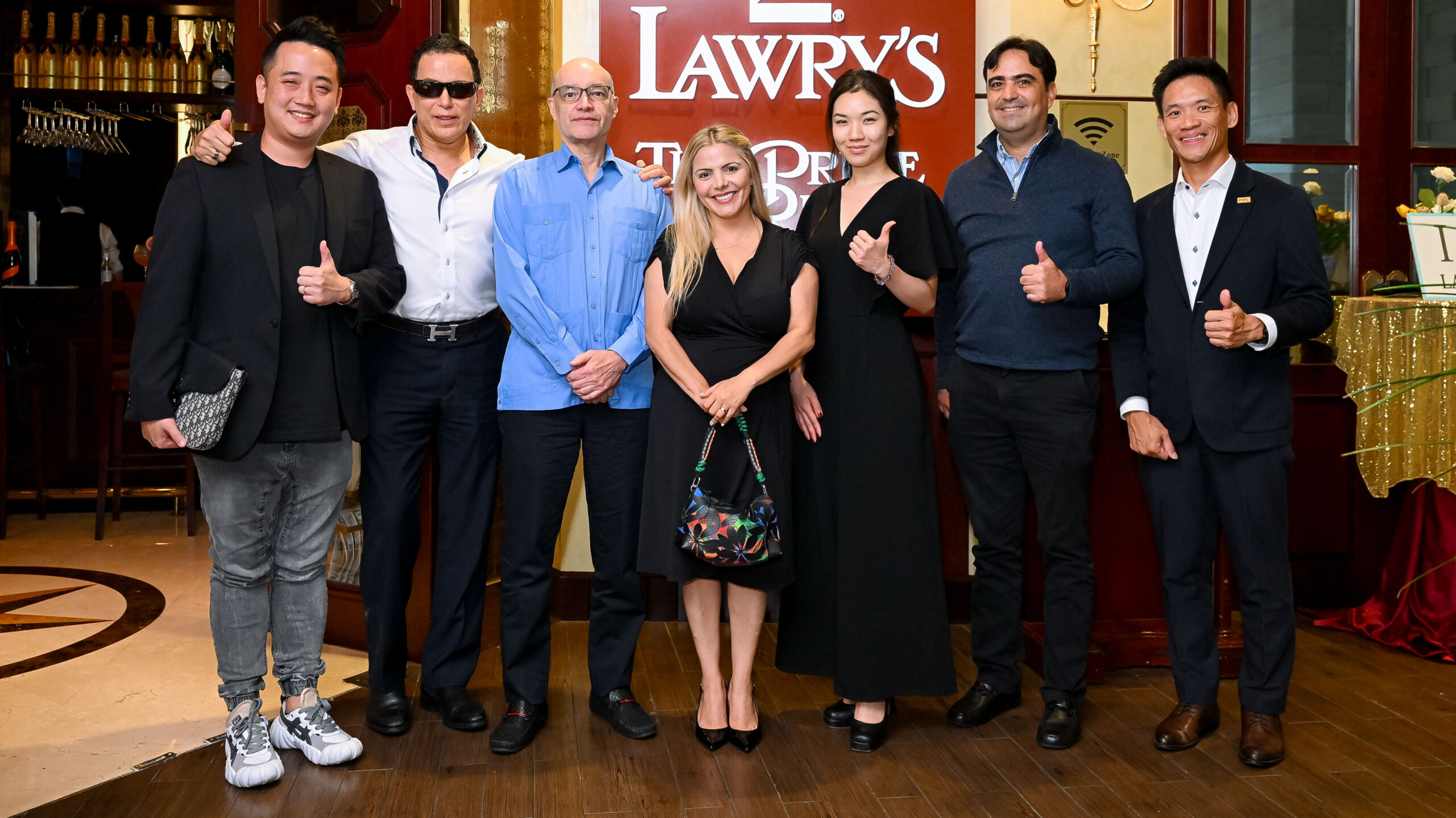 From left to right: Aaron Wan, realtor; Juan Ramon Jimenez, the owner of Lawry’s Prime Rib Singapore;  DNA's Rodrigo Chiari; HE Jessica Lopez, the Venezuelan ambassador to Singapore; Emi Mizushima, associate director at Cathay Cineplexes; HE Enrique Villegas Gonzalez, the Panamanian ambassador to Singapore; and Darren Wong, the senior manager of sales at Performance Motors. 