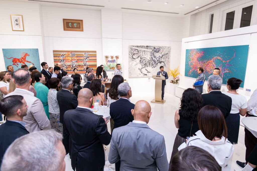 HE Sebastian Breton gave his opening address in front of an excited crowd of art enthusiasts at Gallery NaWei.