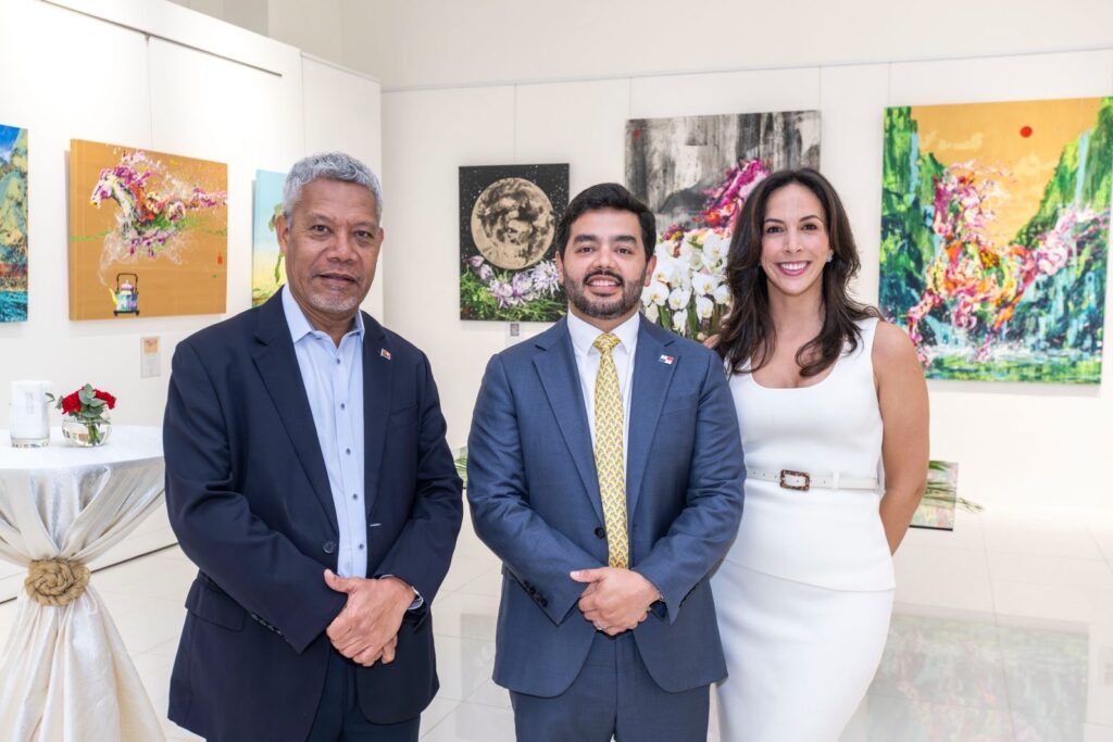 Guest of honour HE Sebastian Breton (centre) welcomed many prominent diplomats at Galloping Beyond Horizons. HE Kapi Maro, High Commissioner of Papua New Guinea (left) was one such guest.